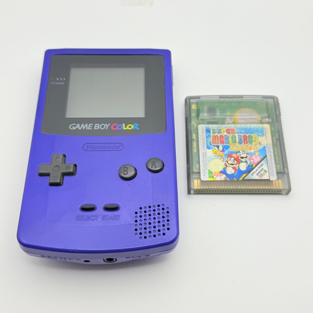 NINTENDO GAME BOY COLOR VIOLA + SUPER MARIO BROS. DELUXE - ORIGINALE PAL EUR