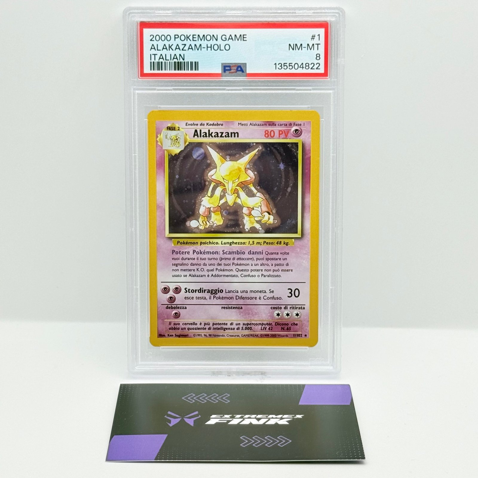CARTA POKÉMON ALAKAZAM HOLO 1/102 (2000) SET BASE UNLIMITED - ITA - PSA 8