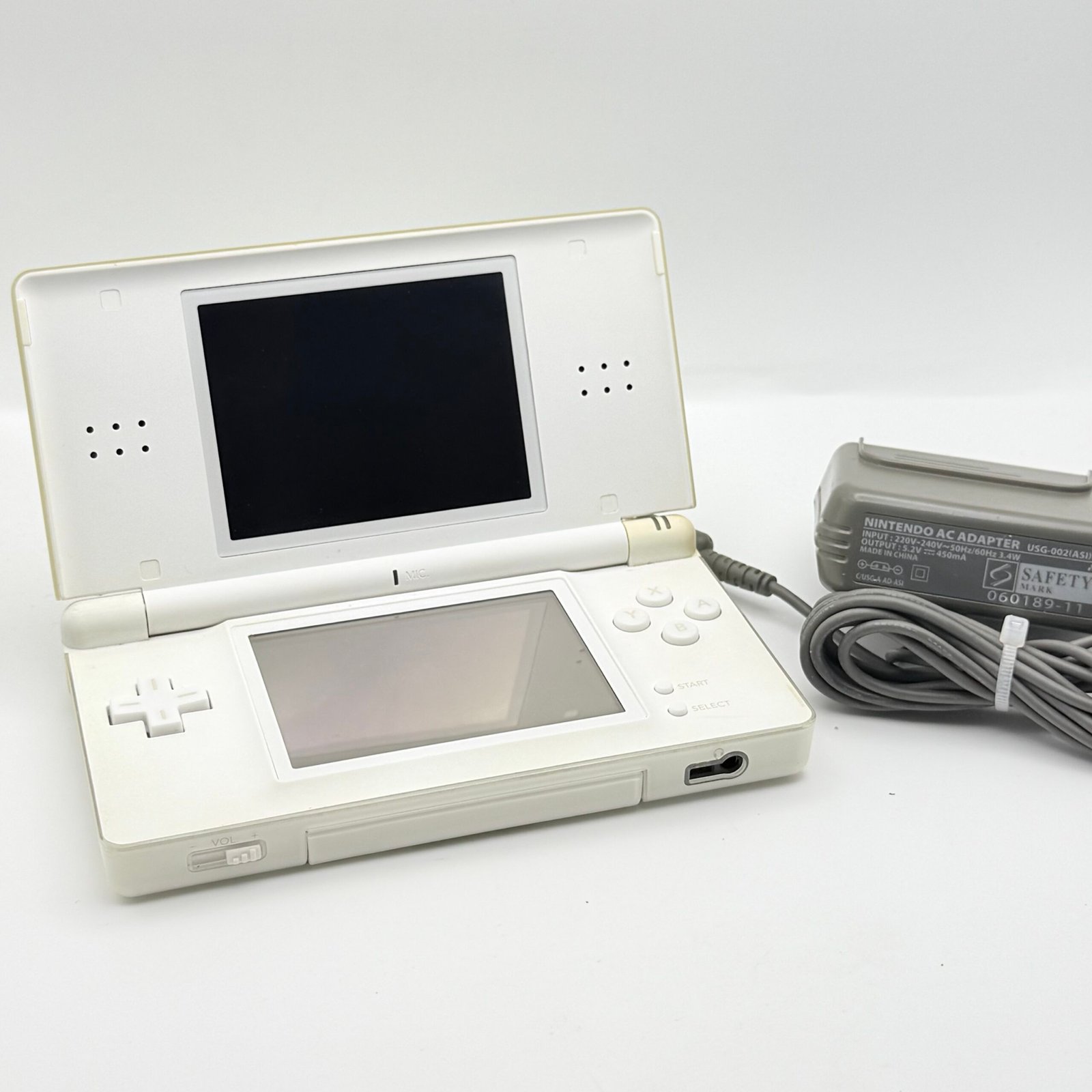NINTENDO DS LITE BIANCO- 100% ORIGINALE TESTATO E FUNZIONANTE + CARICATORE